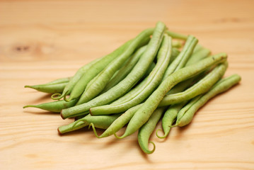 French Beans on wooden surface