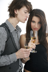 Young couple with glass of champagne