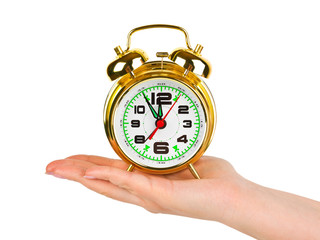Hand with alarm clock