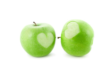 apples with heart isolated on white