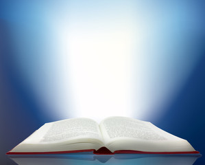 ray of light shining from a book