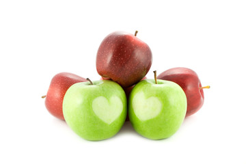 apples with a heart isolated on white