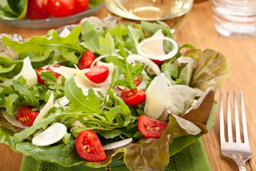 healthy salad with tomatoes, onions, lettuce and cheese