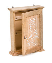 open carved wooden cabinet over white background