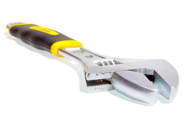 Adjustable wrench isolated on white