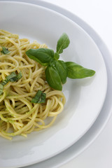 spaghetti with organic home made pesto on a plate