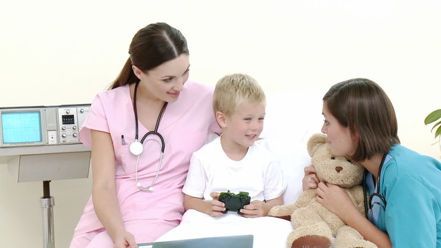 Nurse and Doctor with a little boy