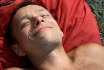 Obraz premium Sunbathing Man