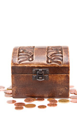 A wooden ancient chest full of money..