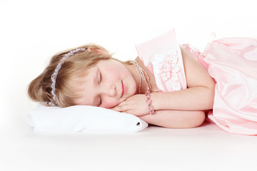 The sleeping girl in a pink dress
