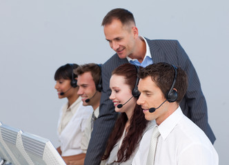 Manager and team working in a call center