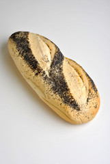 fresh baked poppy seed bread and a bright background