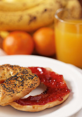 healthy bagel and strawberry jam