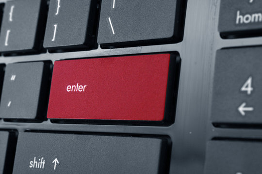 Closeup of enter key on the laptop keyboard
