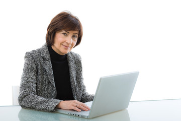 Senior businesswoman using laptop computer