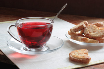 Fruit tea with biscuits