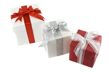 three gift boxes isolated over white