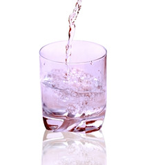 Water in the glass isolated on white