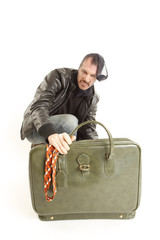 bank robber with vintage suitcase