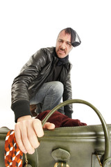 bank robber with vintage suitcase