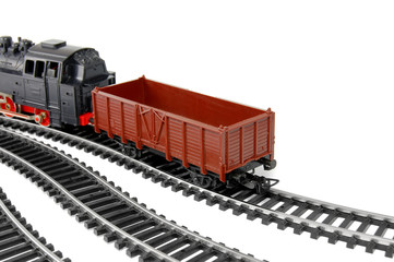 Toy Steam Train and freight wagon on white background