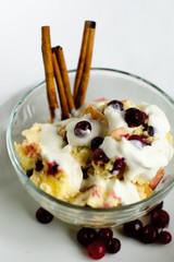 Creamy dessert with cinnamon and cranberries