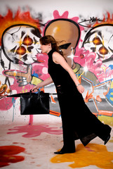 Businesswoman, urban graffiti