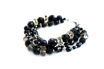 handmade bracelet with black and gray beads isolated