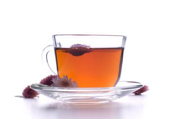 cup of herbal tea with flowers