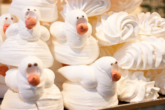 Meringue cookies, decorated to look like Swans
