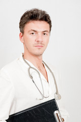 Young handsome male doctor with stethoscope