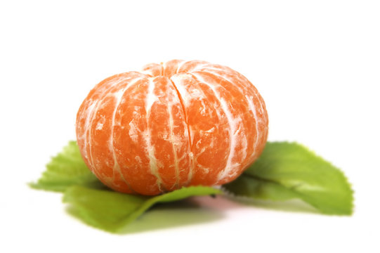 isolated tangerine with leaves on a white background