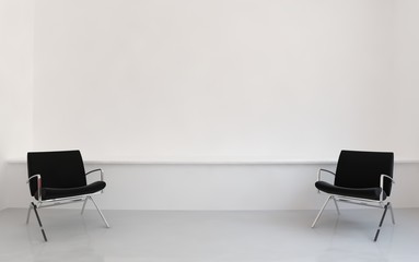 Chairs to face a blank wall