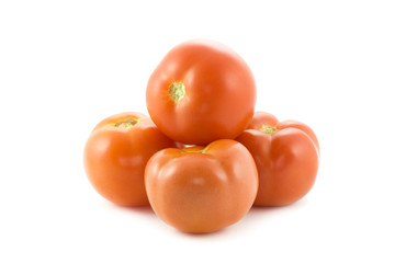 pile of tomatoes isolated on white