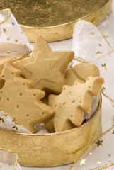Assorted Christmas biscuits in a golden box.