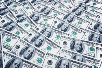 Stack of dollars on money background