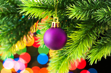 Obraz na płótnie Canvas Christmas decoration and blurred lights at background