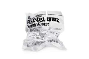 Crumpled newapaper with article about financial breakdown