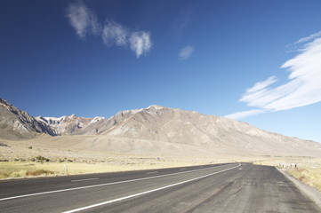 highway through the mountains in death valley