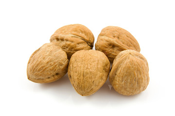 some walnuts over white background