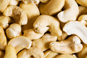 Cashew nuts arranged at the background