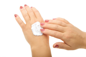 Hands with cream  isolated on white