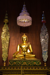 Buddha image in church of Wat Phra Kaew, Chiang Rai, Thailand
