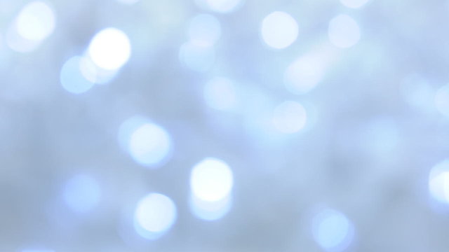 Sparkling blue and white bokeh lights, winter holiday background - video HD