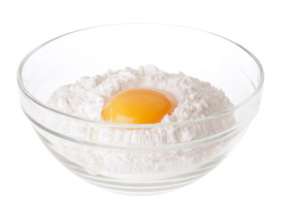 heap white meal with egg yolk in glass cup