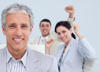 Portrait of a senior manager in a business celebration