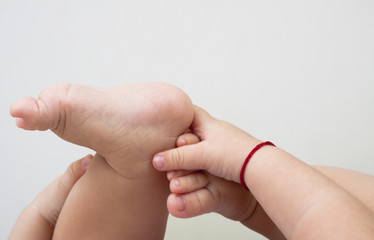 holding feet