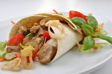 home made tortillia with organic pork goulash