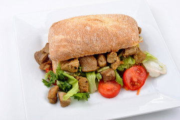 home made bread roll with organic pork goulash