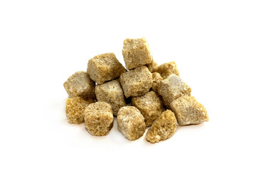 Brown reed sugar isolated on white